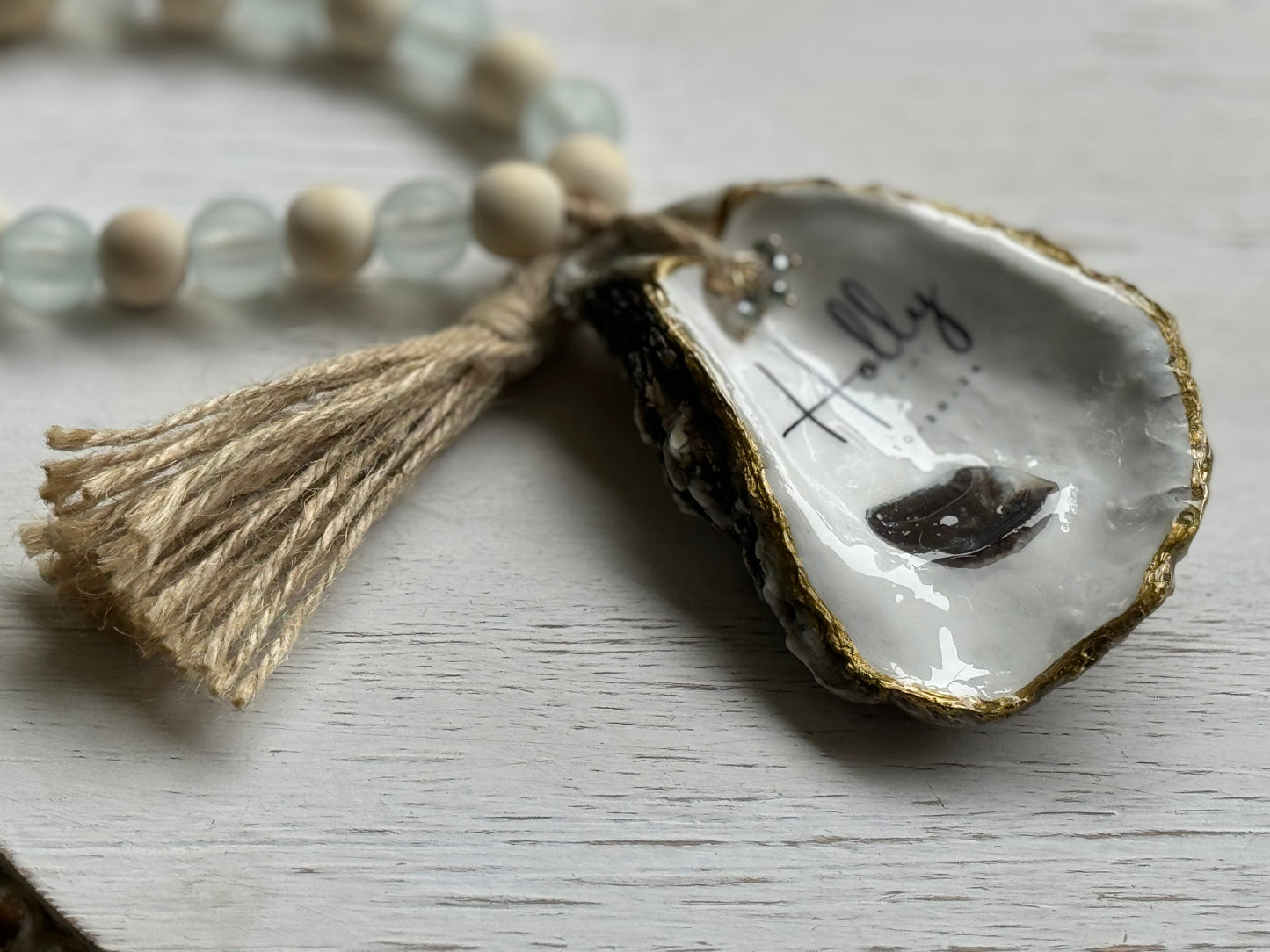Hand-Painted Couple's Oyster Shell Ornament – A unique and charming keepsake, perfect for newlyweds, bridal showers, or Christmas gifts. This oyster shell ornament or wine charm features intricate hand-painted designs, making it a personalized and thoughtful gift for couples. Celebrate love and special occasions with this coastal-inspired piece, ideal for weddings, anniversaries, or as a memorable holiday ornament. A beautiful symbol of connection and elegance.